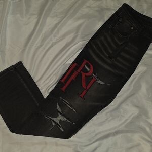 AMIRI Black Denim Jeans with Branded Leather Patch